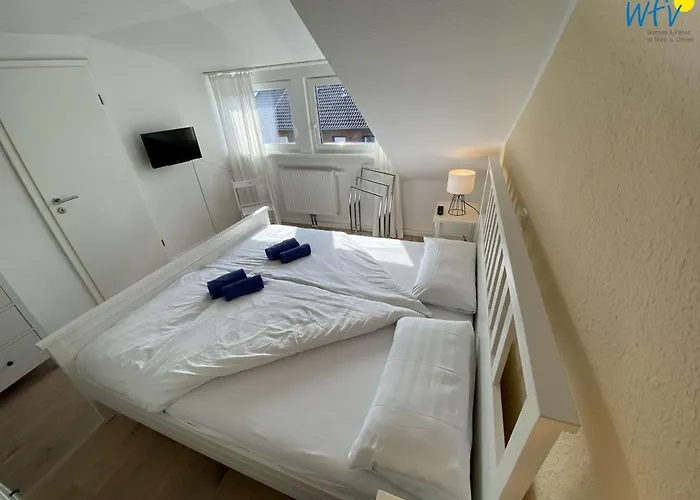 度假居 Siedlerstrasse 11 Wangerooger Inselhaeuschen 万根沃格